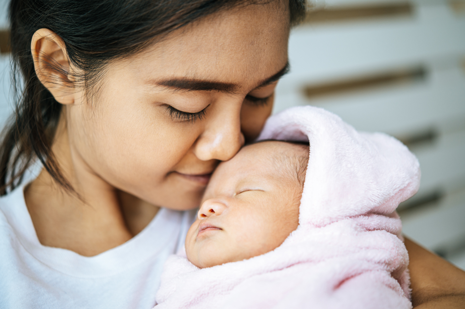 woman-with-newborn